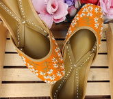 Orange Colour Jutti With White Embroidery Work