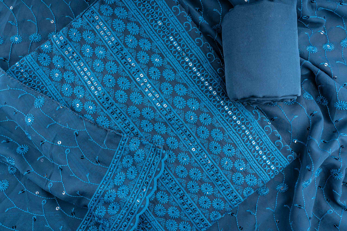 Unstitched Blue color suit with premium chicken and sequin work on georgette base