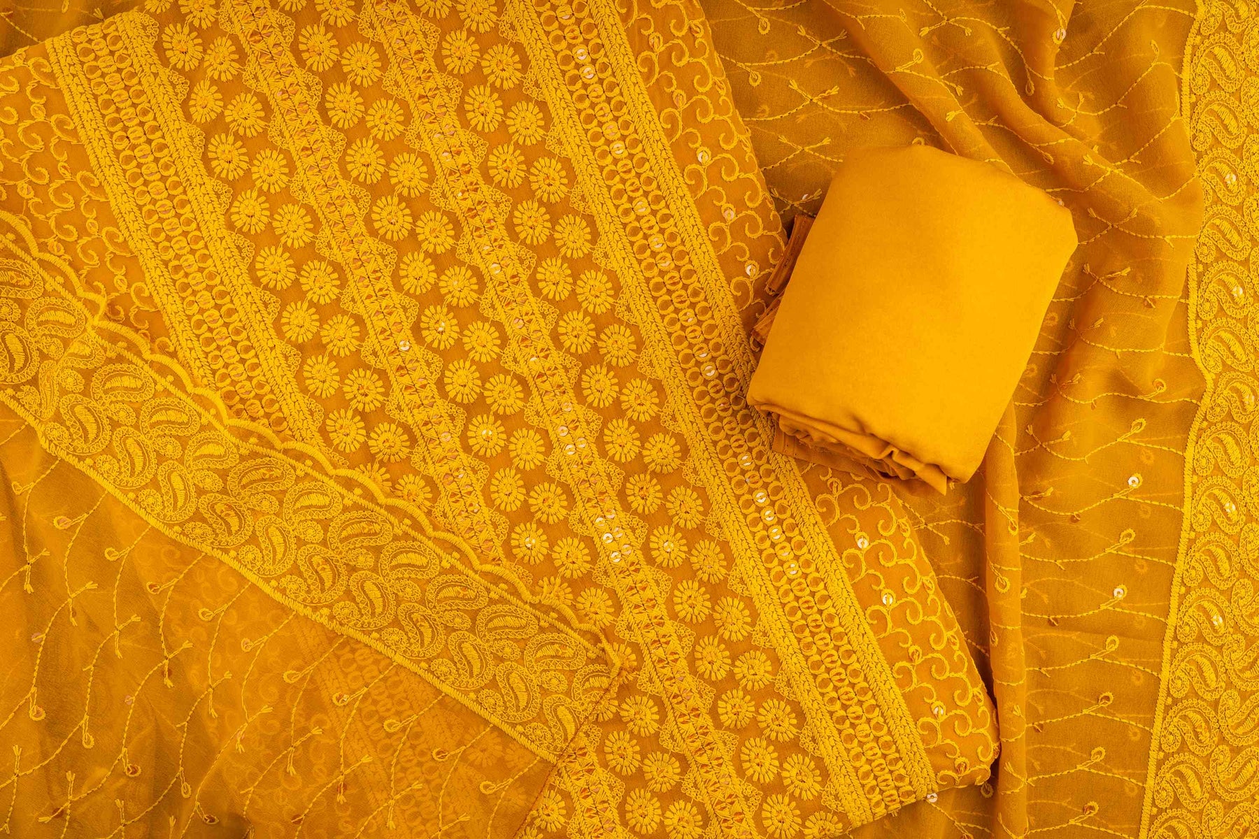 Unstitched Yellow color suit with premium chicken and sequin work on georgette base